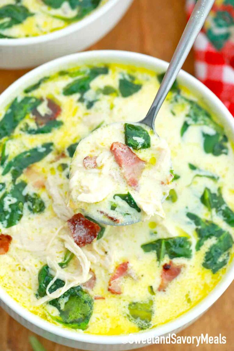 a bowl of cream cheese chicken soup with bacon