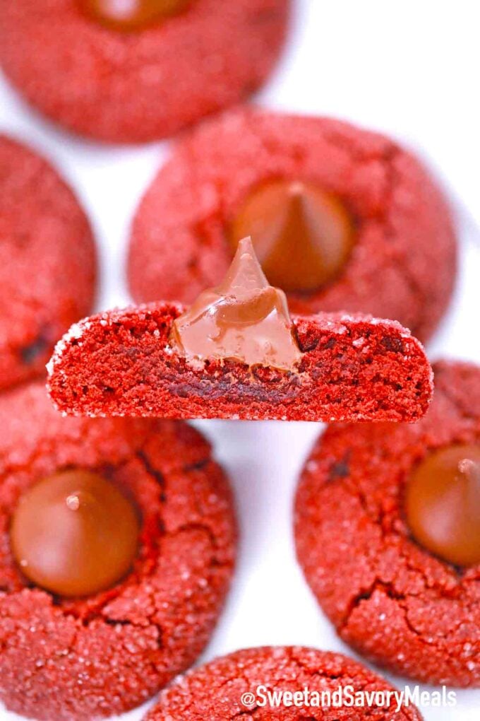 red velvet hershey’s kiss cookie cut in half