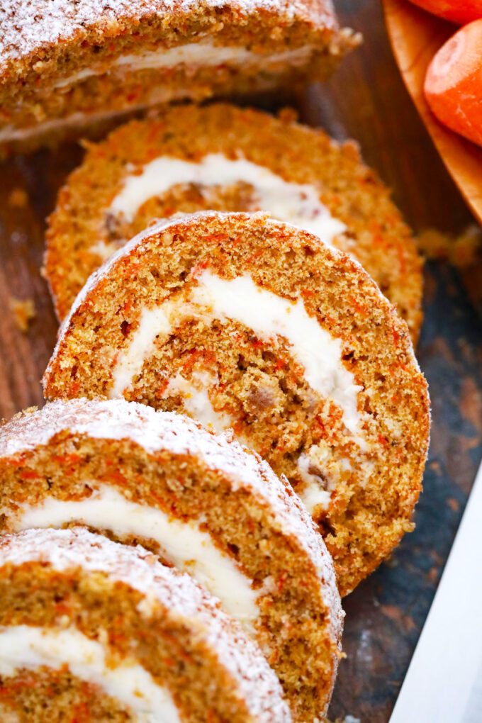 Tender and creamy carrot cake roll with cream cheese frosting.