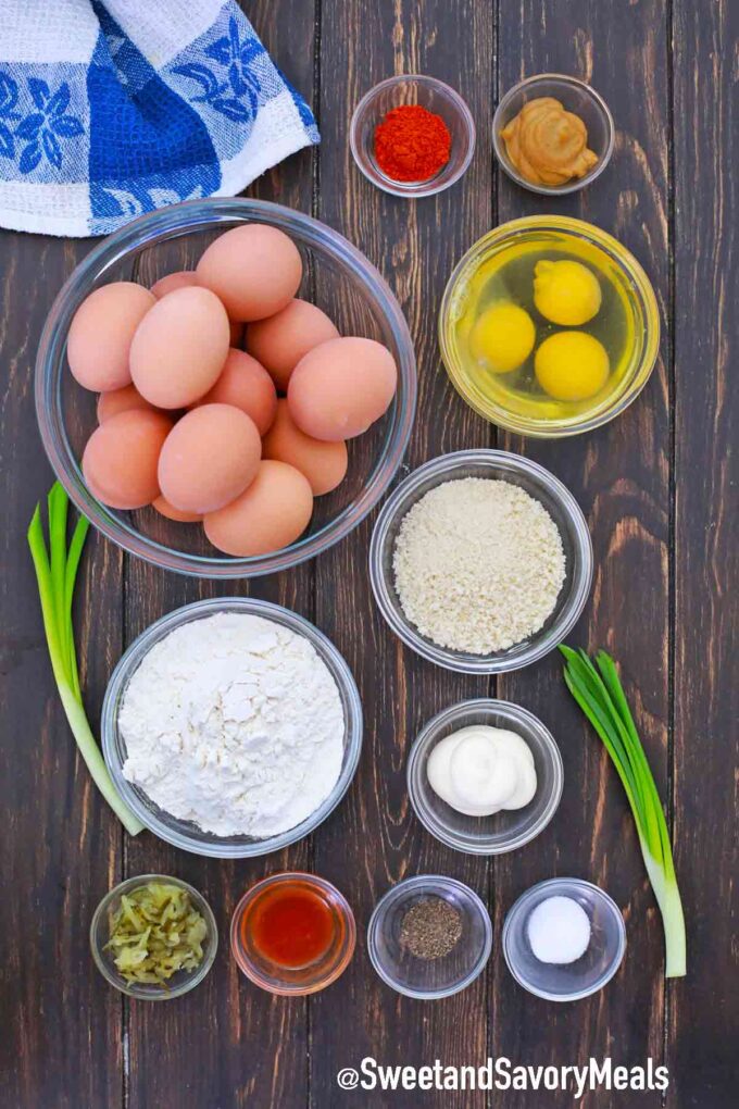 eggs and other ingredients in bowls on a table