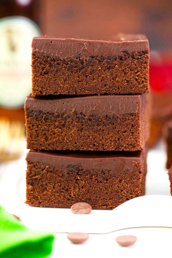 three fudgy guinness chocolate brownies stacked on top of each other