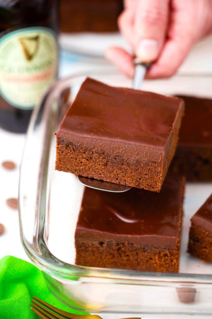 sliced guinness chocolate brownies with one brownie on a serving spatula