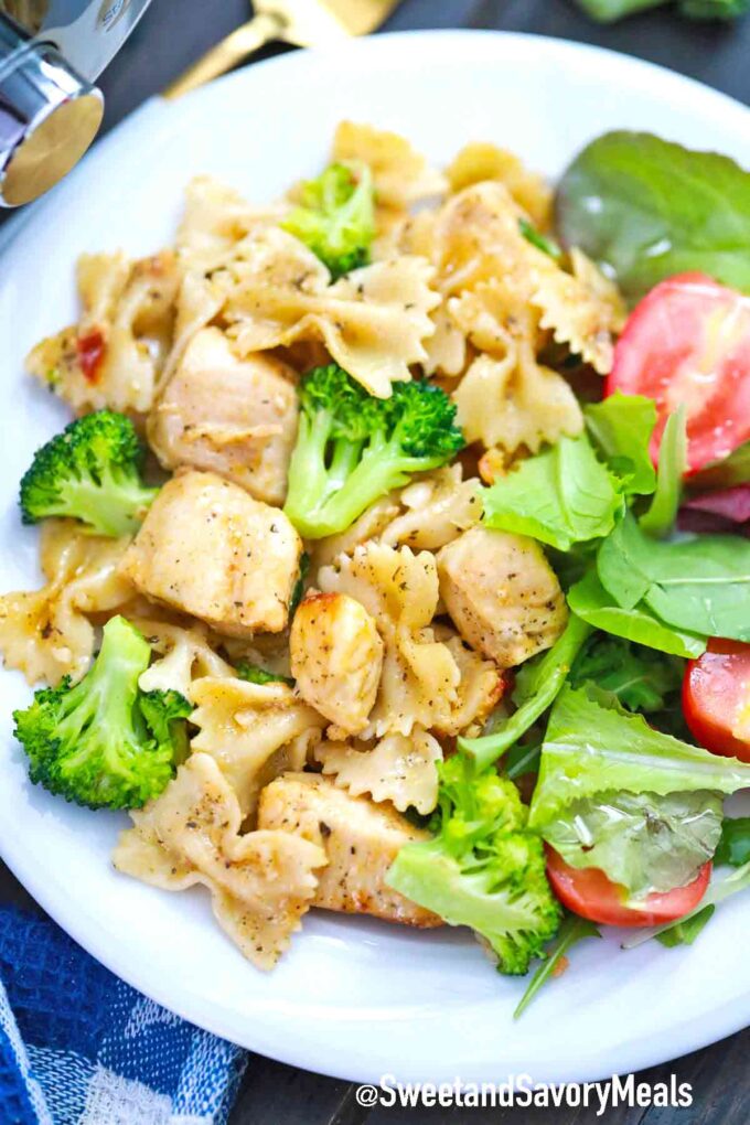 a plate of chicken broccoli pasta