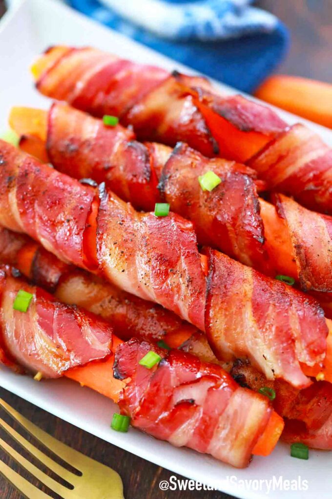 a plate of crispy bacon wrapped carrots