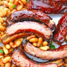 bbq pork ribs and baked beans on a plate