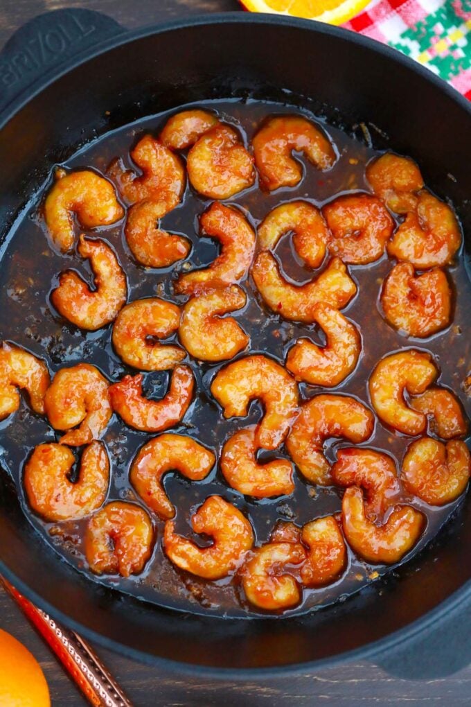 Overhead shot of a pan of crispy orange shrimp;