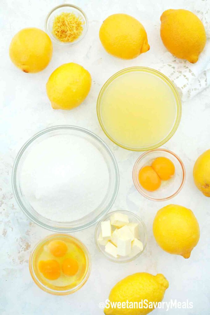 lemons and other ingredients in bowls onto a white table