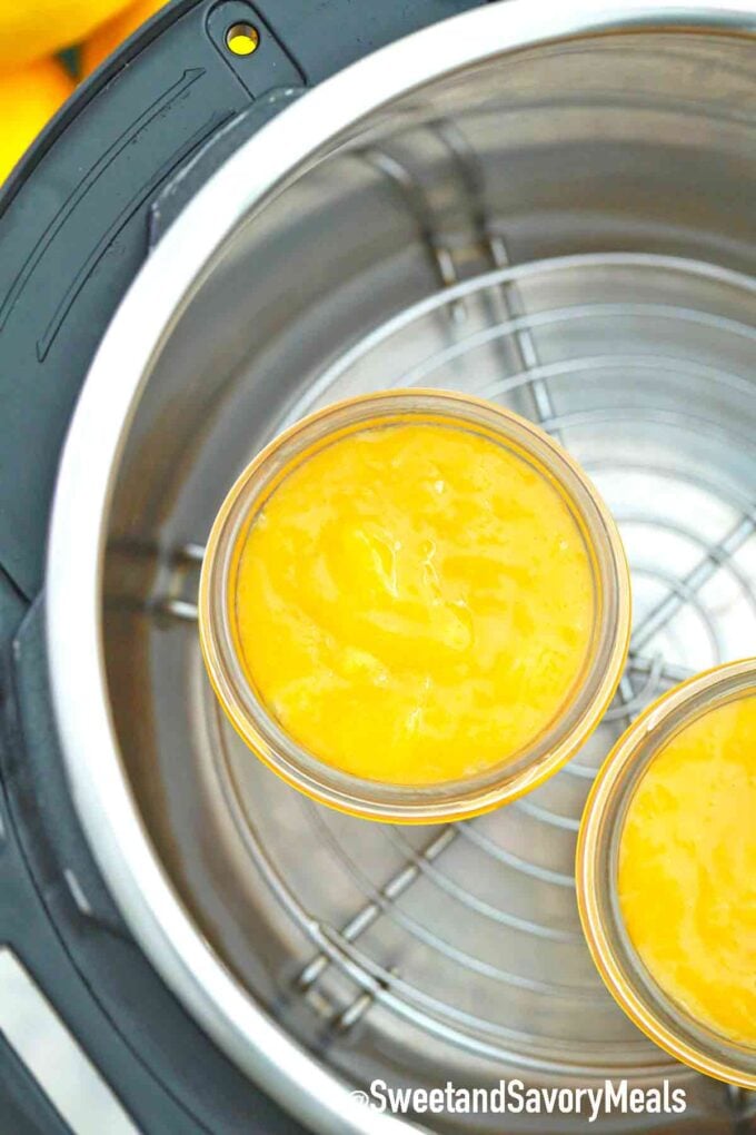 lemon curd in jars onto a trivet in the instant pot