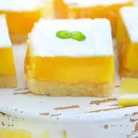 lemon squares on q white cutting board