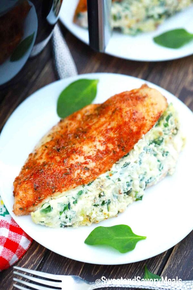 air fried stuffed chicken breast with a creamy spinach filling on a plate