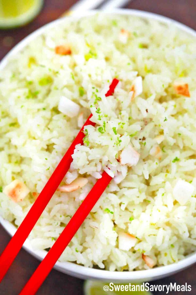 fluffy coconut rice topped with lime zest and toasted coconut