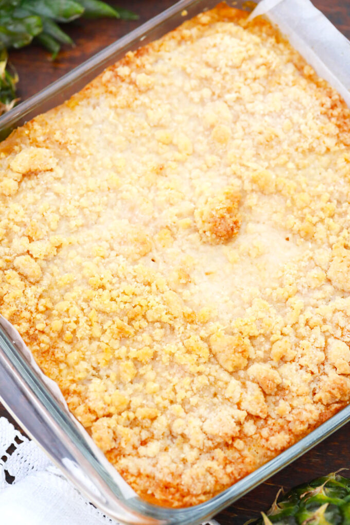 Overhead shot of baked pineapple crumb bars.