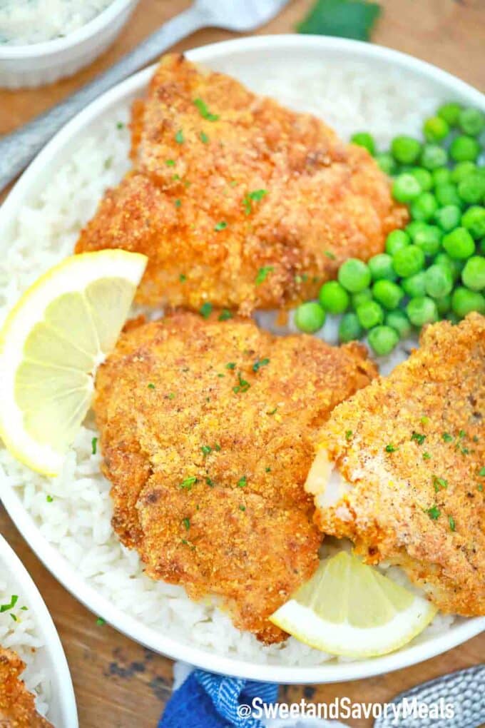 air fried fish fillets served with rice and green peas