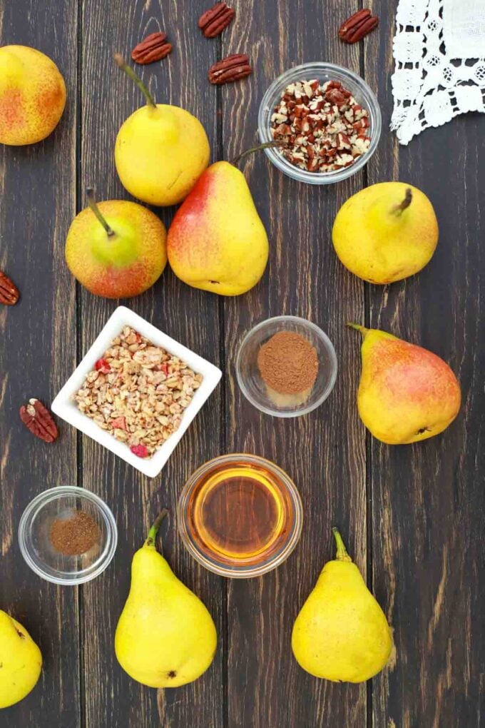 pears on a table and ingredients in bowls