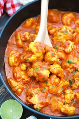 cast iron pan of indian coconut butter cauliflower