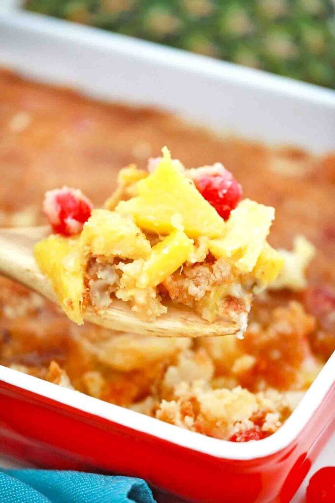 a baking dish with pineapple dump cake