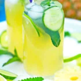 glasses of pineapple lemonade with cucumber