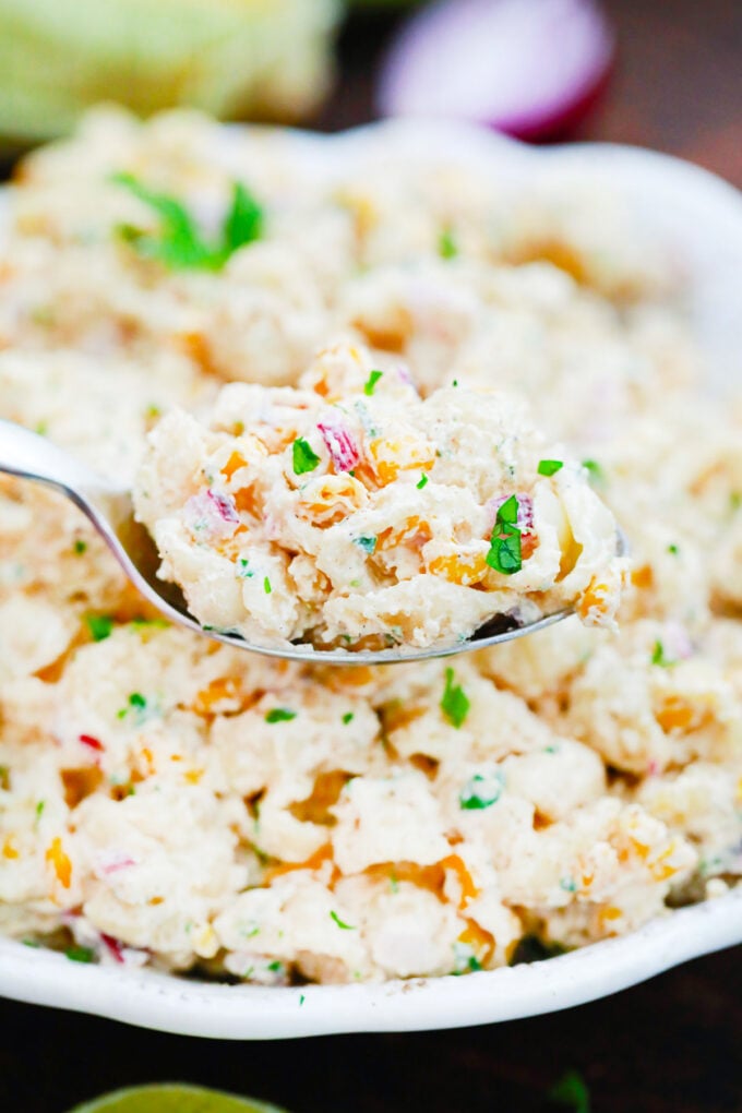 A spoonful of homemade Mexican street corn pasta salad.