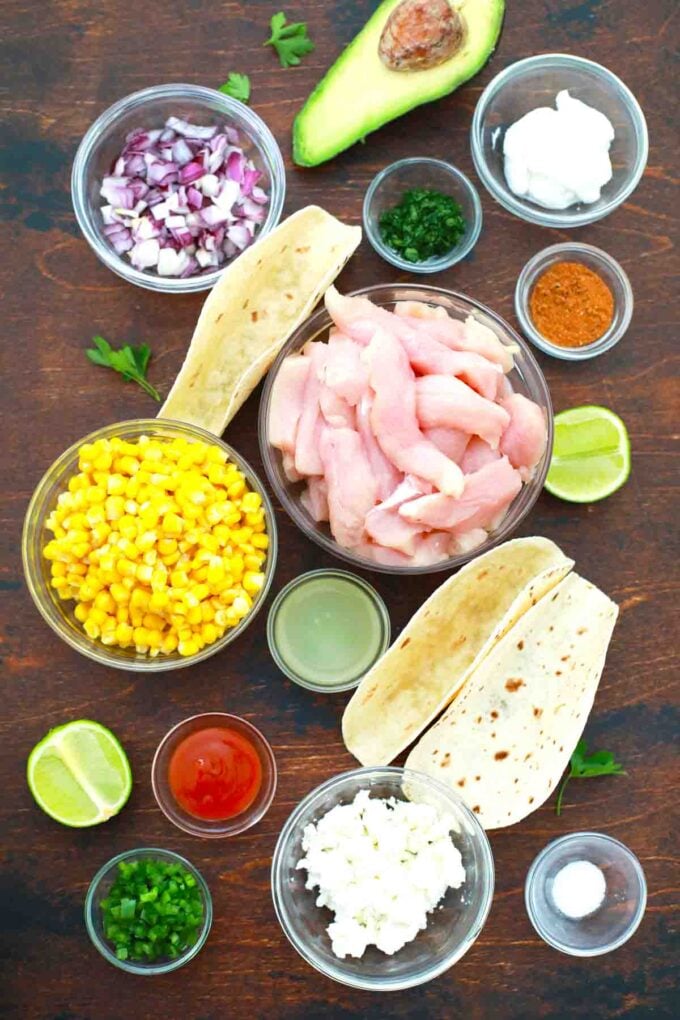overhead shot of ingredients in bowls on a wooden table