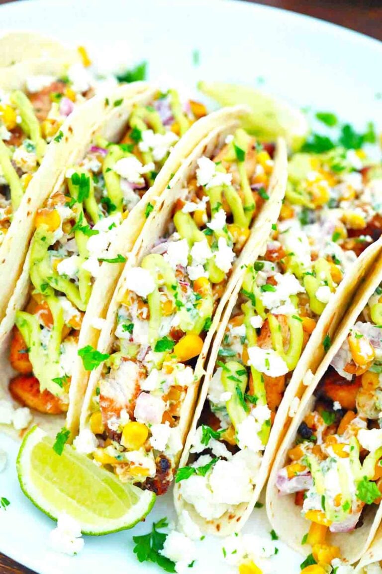 macro close shot of mexican street corn chicken tacos