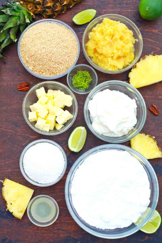 overhead shot of bowls with crushed pineapple cool whip graham cracker crumbs sugar lime juice