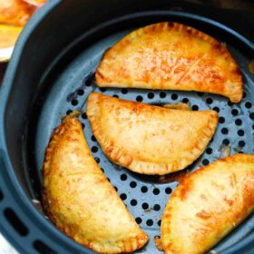 air fried peach hand pies in the air fryer basket