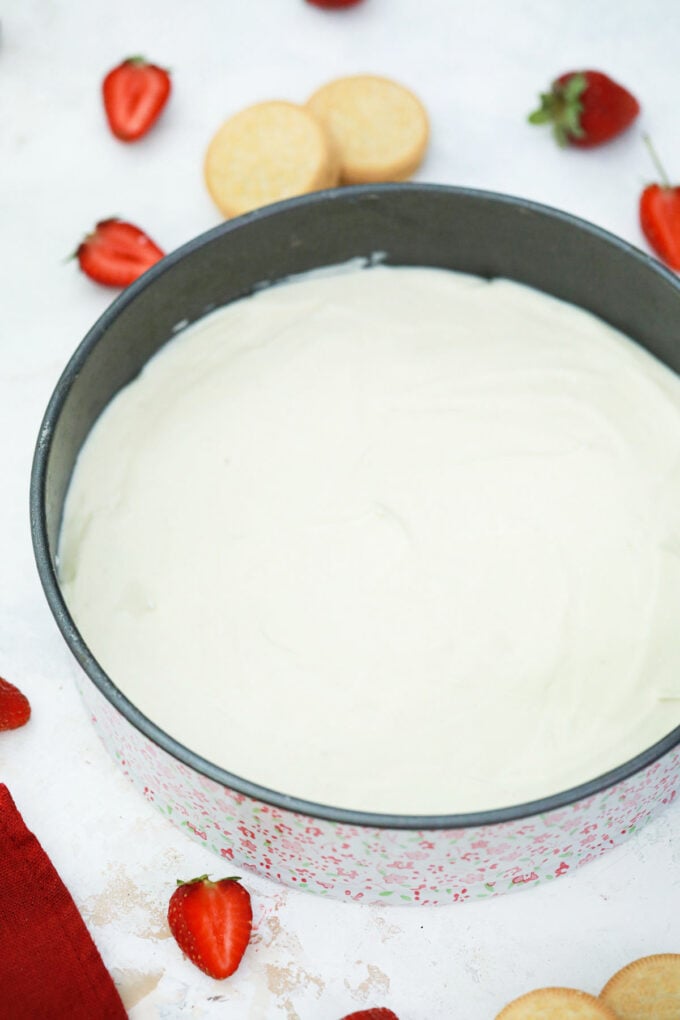 Cheesecake batter in a springform pan.