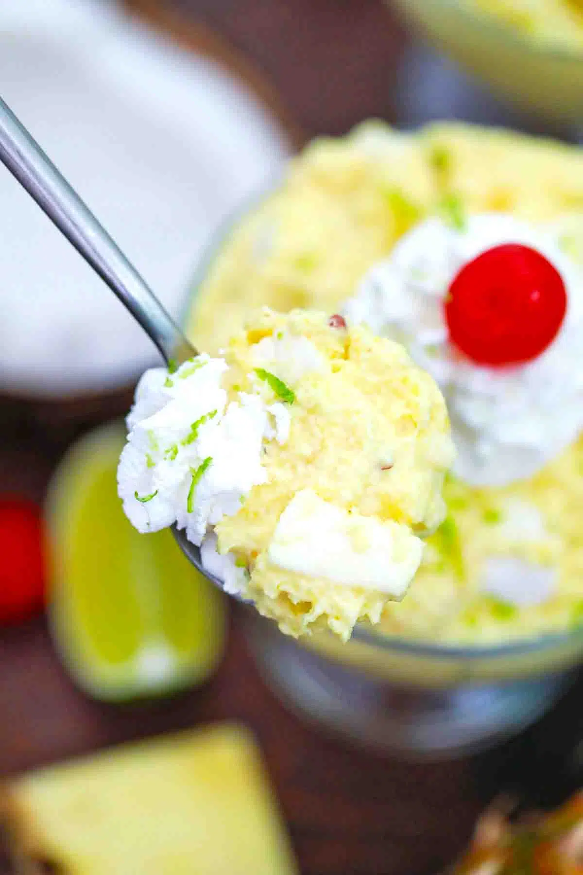macro overhead shot of a spoonful of pineapple fluff