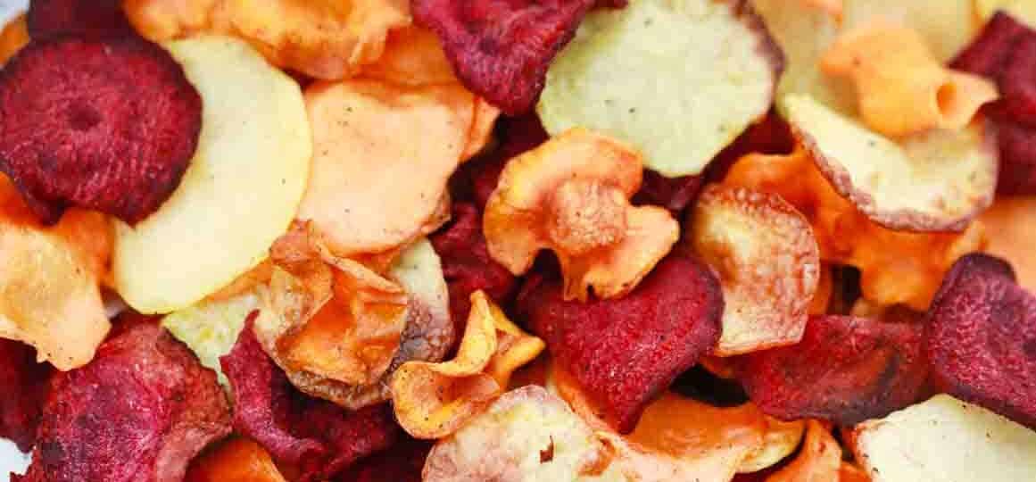 overhead shot of colorful air fryer veggie chips medley