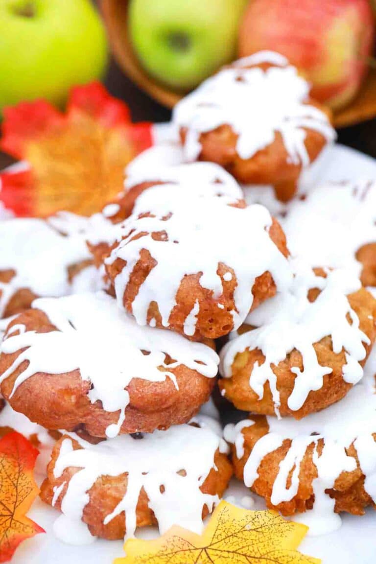 a platter of apple fritter with glaze