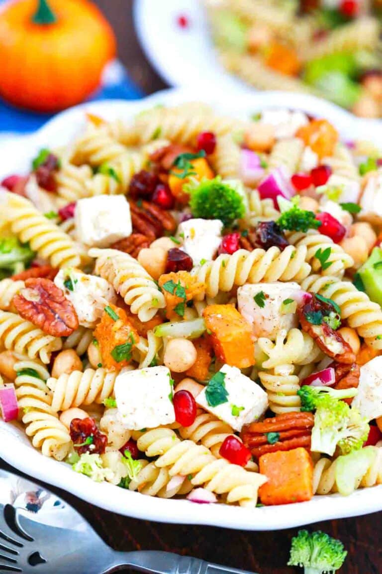 close shot of fall pasta salad with butternut squash and pomegranates and broccoli