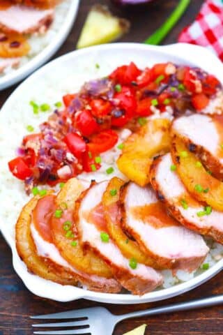 sliced hawaiian pineapple pork loin served with rice