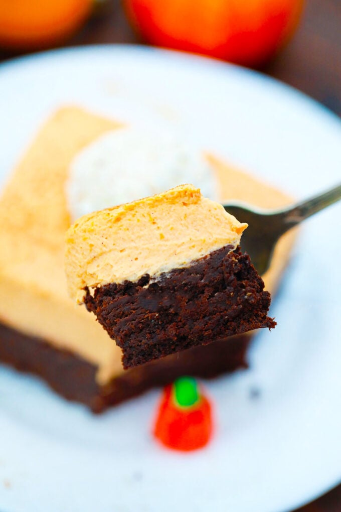 A forkful of creamy pumpkin mousse brownies.