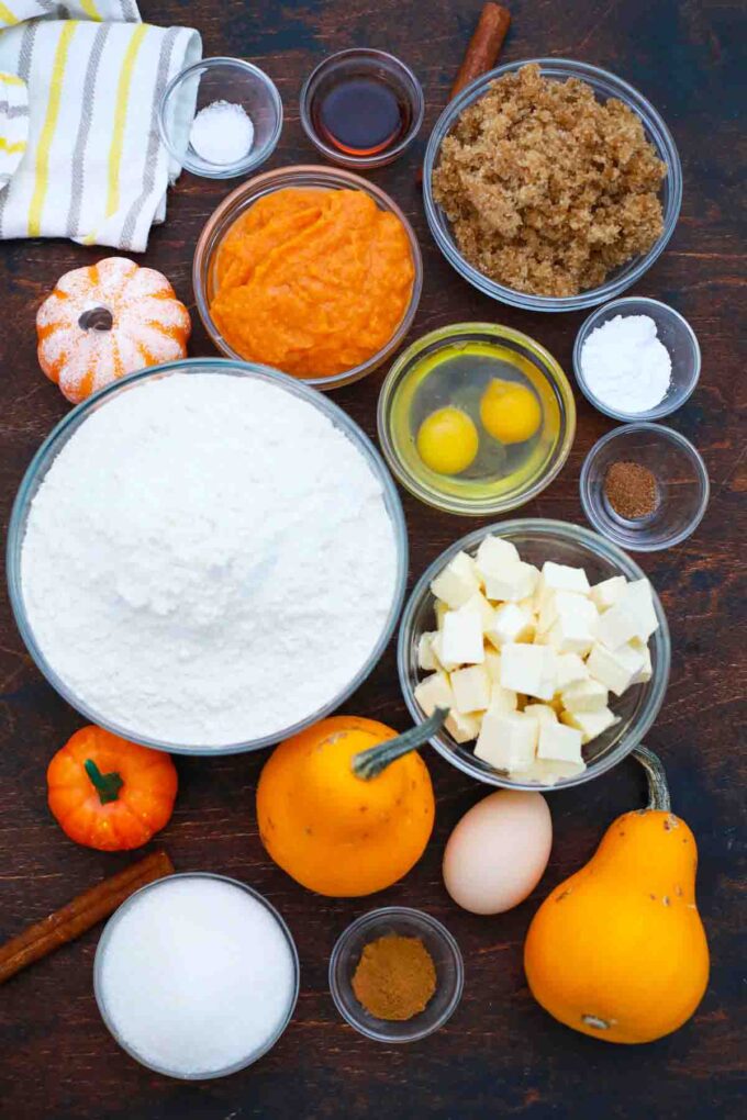 overhead shot sugar butter flour pumpkin in bowls on a table