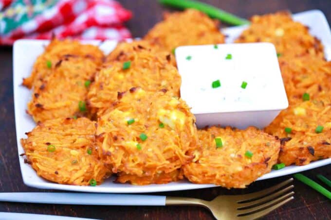 a plate of sweet potato fritters