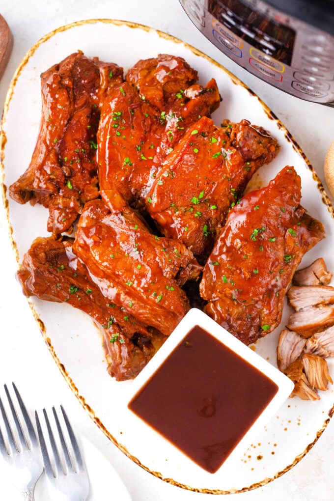 Instant Pot country style ribs covered in BBQ sauce.