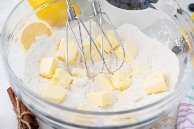 Whisking butter into flour.
