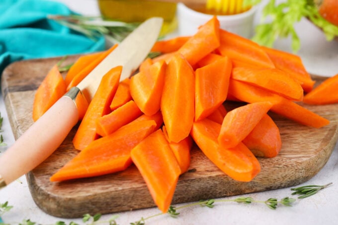 Chopped carrots on a cutting board.