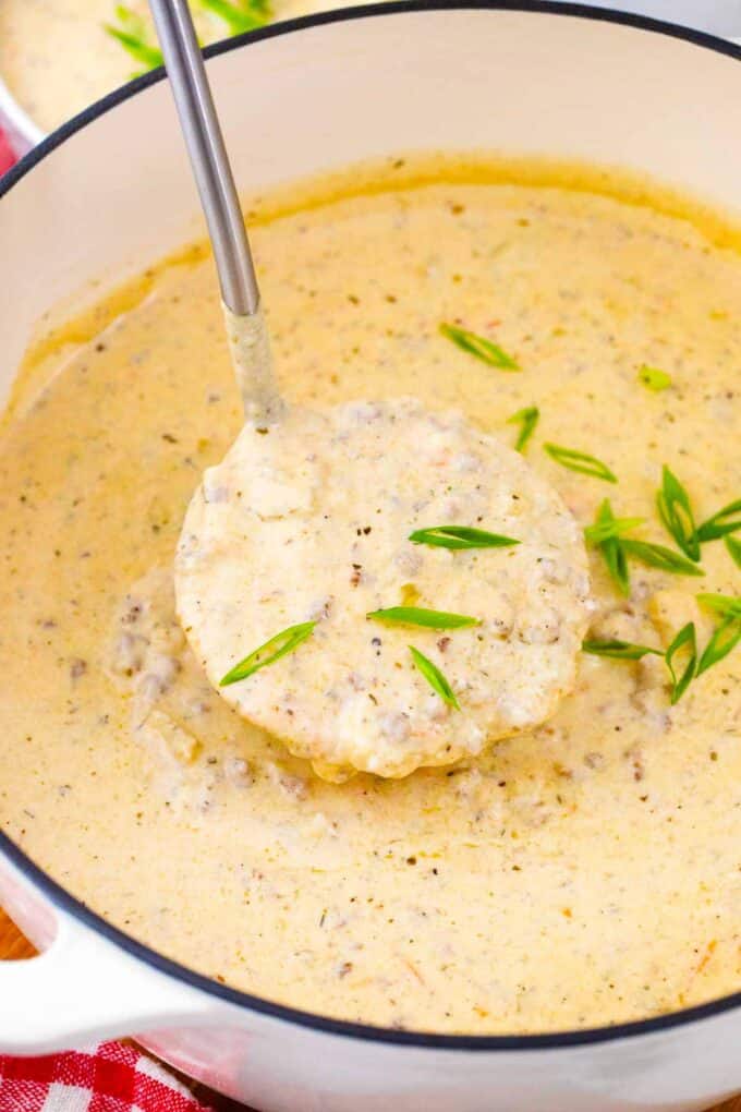 a ladle of cheesy cheeseburger soup