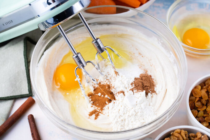 Whipping cheesecake batter for carrot cake cheesecake.