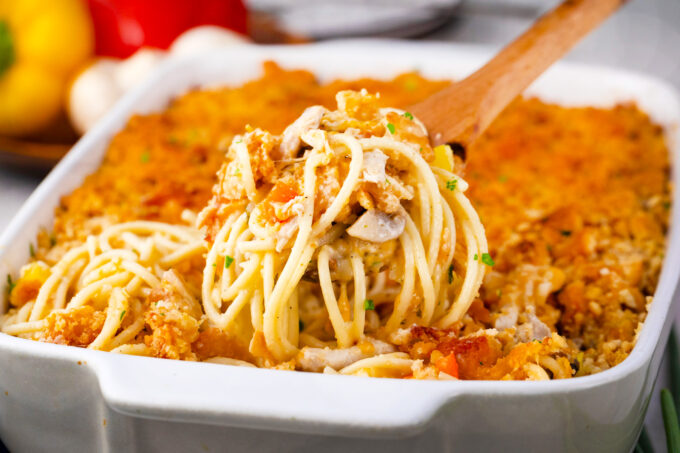 A spoonful of homemade baked chicken spaghetti casserole.