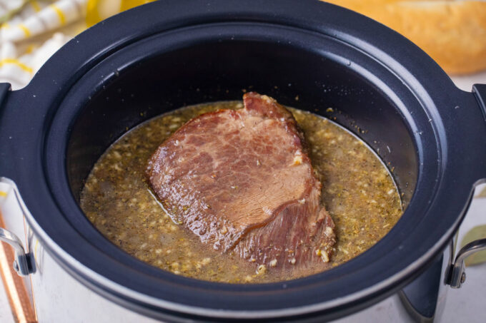 Slow cooking a beef chuck.