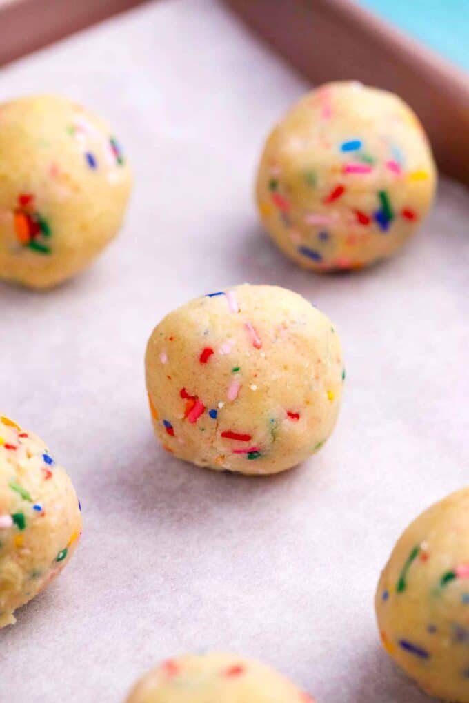 funfetti cake truffle on a baking sheet