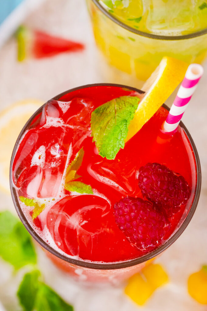 Overhead shot of raspberry mojito.