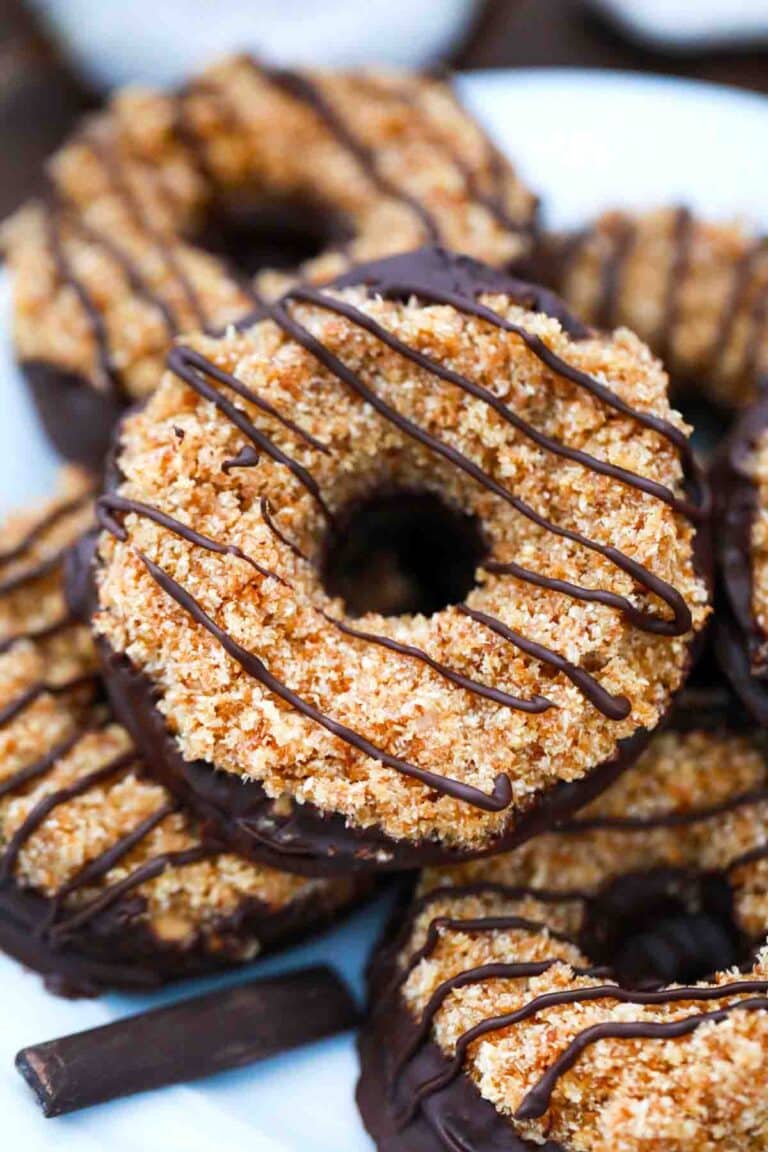 overhead shot of homemade girl scout samoas cookies stacked on a plate