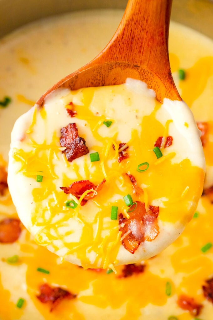 A ladle of cheesy Instant Pot loaded baked potato soup.