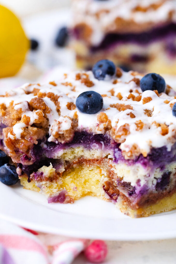 Close shot of a slice of blueberry coffee cake.
