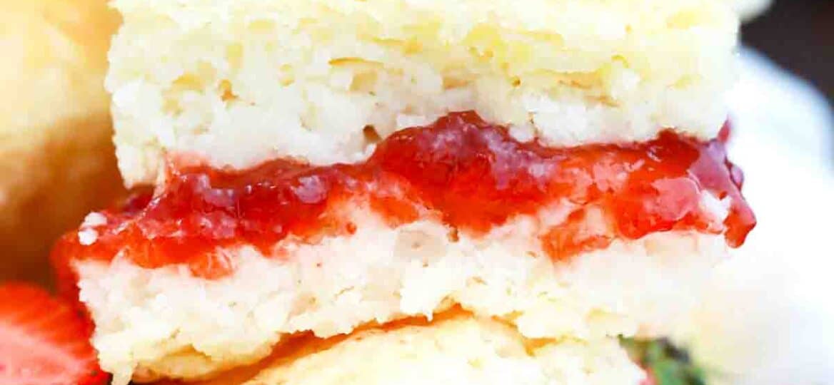 butter swim biscuits with strawberry jam