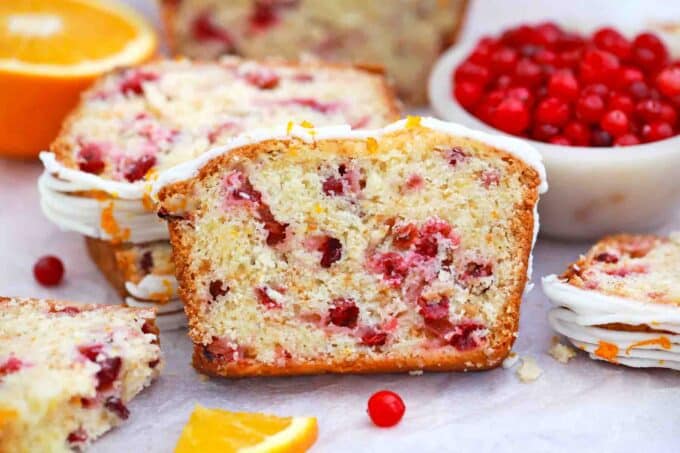 frontal shot of a slice of cranberry orange bread