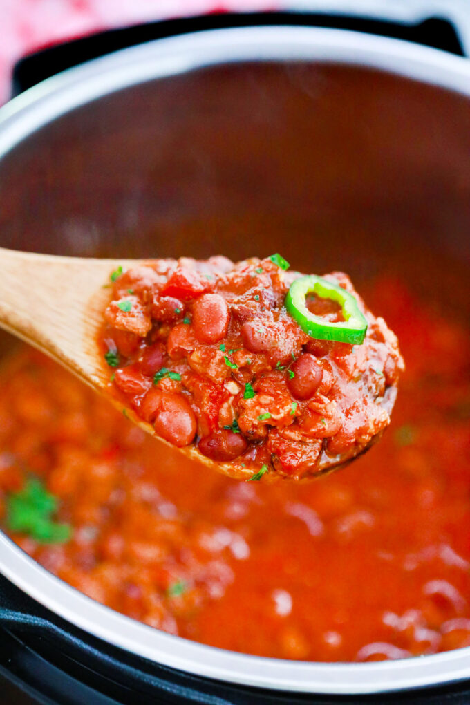 A spoonful of instant pot turkey chili with beans.